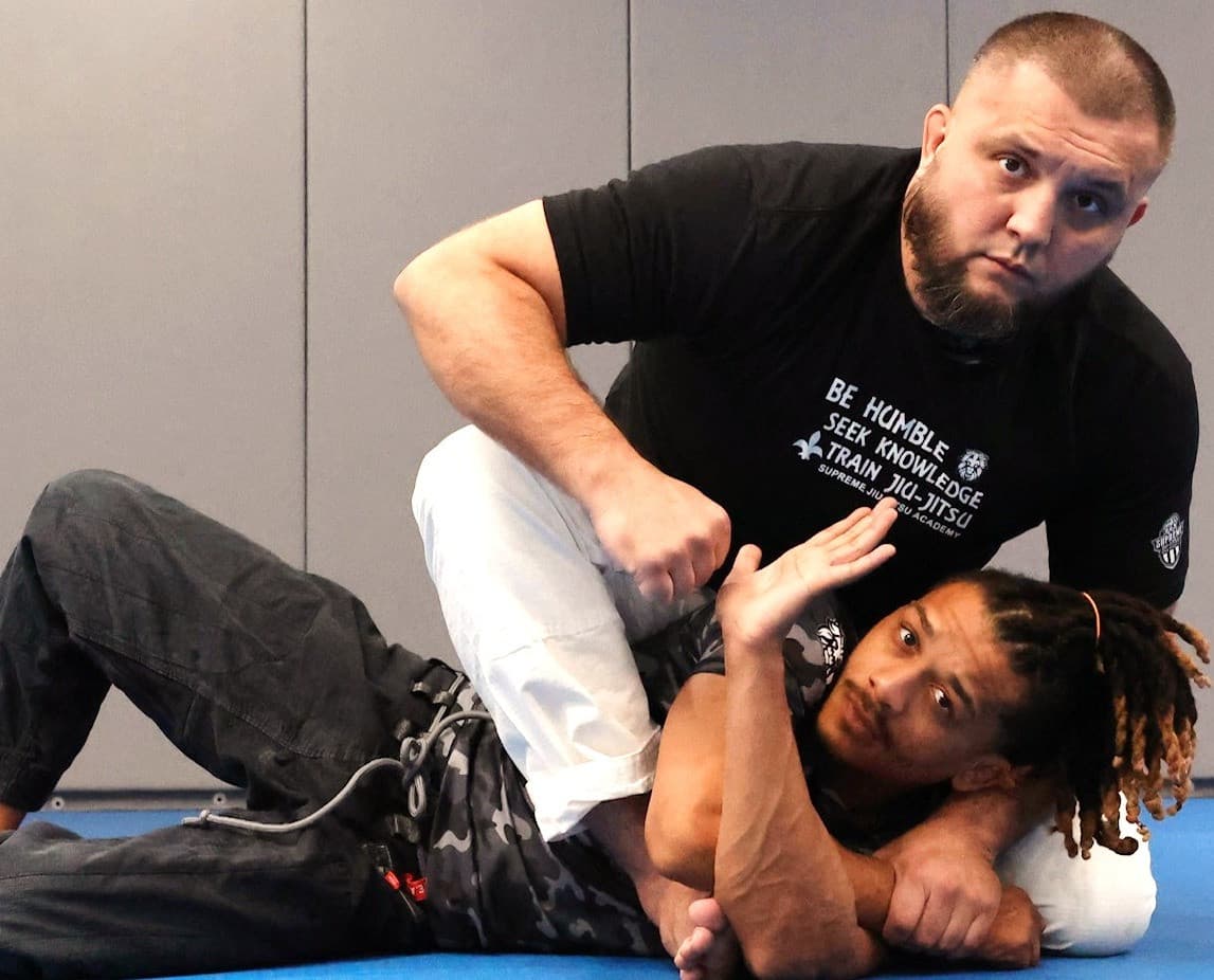 Supreme JIU JITSU Chicago Idriz Redzovic logo
